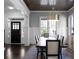 Dining room featuring a modern chandelier, and a large table with seating for six, and a decorative ceiling at 2019 Mason Mill Rd, Decatur, GA 30033