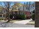 A spacious two-story home featuring brick and stone accents, a well-manicured lawn, and convenient driveway at 2019 Mason Mill Rd, Decatur, GA 30033