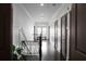 Well-lit hallway with dark hardwood floors and classic white trim at 2019 Mason Mill Rd, Decatur, GA 30033