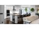 Open concept kitchen features stainless appliances, a center island, and eat-in breakfast bar at 2019 Mason Mill Rd, Decatur, GA 30033