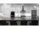 Well-lit kitchen with stainless steel appliances, a center island, and seating at 2019 Mason Mill Rd, Decatur, GA 30033