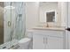 Modern bathroom featuring a glass-enclosed shower and marble accents at 2848 Tanner Lake Nw Trl, Marietta, GA 30064