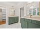 Stylish bathroom with double vanities, designer fixtures and lots of natural light at 2848 Tanner Lake Nw Trl, Marietta, GA 30064