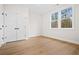Bedroom featuring double door closet and natural light at 2848 Tanner Lake Nw Trl, Marietta, GA 30064
