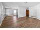 Spacious living room with modern wood floors, neutral paint, and plenty of natural light at 6165 Short St, Canton, GA 30114
