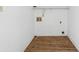 Functional utility room with wood floors and a laundry hookup at 6165 Short St, Canton, GA 30114