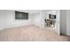Spacious carpeted basement leading to an open kitchen and dining area perfect for entertaining at 302 W Country Dr, Johns Creek, GA 30097