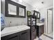 Bathroom showcasing dual vanities, updated fixtures, and a well-lit mirror for added convenience at 302 W Country Dr, Johns Creek, GA 30097
