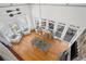 Aerial view of a bright dining area with large windows and an open floor plan at 302 W Country Dr, Johns Creek, GA 30097