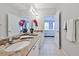 Bathroom boasts double sinks with granite countertops and access to Primary bedroom at 10 Perimeter Summit Ne Blvd # 1208, Brookhaven, GA 30319