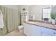 Comfortable bathroom featuring modern finishes, a shower, and marbled countertop at 10 Perimeter Summit Ne Blvd # 1208, Brookhaven, GA 30319