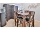 Dining room features wooden table, seating for four and room divider at 10 Perimeter Summit Ne Blvd # 1208, Brookhaven, GA 30319