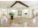 Spacious hallway with tiled floors, architectural beams, and decorative lighting at 10 Perimeter Summit Ne Blvd # 1208, Brookhaven, GA 30319
