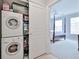 Convenient laundry room closet next to bedroom at 10 Perimeter Summit Ne Blvd # 1208, Brookhaven, GA 30319