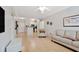 Bright living area featuring hardwood floors, neutral tones and an open concept design at 10 Perimeter Summit Ne Blvd # 1208, Brookhaven, GA 30319