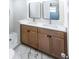 Bathroom with double vanity, stone countertops, and shower at 6175 Marilla St, Douglasville, GA 30135
