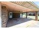 Spacious carport featuring brick columns and access to storage rooms with a beautiful exterior view at 6175 Marilla St, Douglasville, GA 30135