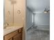 Bathroom sink and mirror next to an entryway into a bedroom at 1270 Della Way, Lawrenceville, GA 30043