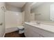 Bathroom featuring a tub and shower combination with vanity at 1270 Della Way, Lawrenceville, GA 30043