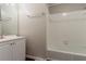 Bathroom with white vanity and tiled shower/tub at 1270 Della Way, Lawrenceville, GA 30043