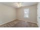 Bedroom featuring neutral walls and carpet and a bright window at 1270 Della Way, Lawrenceville, GA 30043