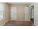 Bedroom with 2 doors and natural light at 1270 Della Way, Lawrenceville, GA 30043