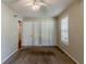 Bedroom includes carpet, ceiling fan, and built-in closets at 1270 Della Way, Lawrenceville, GA 30043