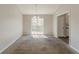 Dining room featuring a sliding glass door leading to the back deck at 1270 Della Way, Lawrenceville, GA 30043