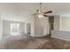 Spacious living room featuring a sliding glass door and carpeted floor at 1270 Della Way, Lawrenceville, GA 30043