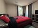 Spacious bedroom with a comfortable bed, ample natural light, and a cozy atmosphere for relaxation at 3533 Johns Rd, Tucker, GA 30084
