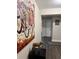 Hallway decorated with colorful bicycle painting and animal statue at 3533 Johns Rd, Tucker, GA 30084