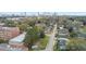 Aerial view of brick building with gardens and downtown skyline in the background at 992 Beckwith Sw St, Atlanta, GA 30314
