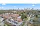 Aerial view of brick building with parking and downtown skyline in the background at 992 Beckwith Sw St, Atlanta, GA 30314