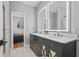Stylish bathroom with dual sinks, decorative vanity, and modern lighting at 992 Beckwith Sw St, Atlanta, GA 30314