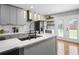 Bright kitchen with white countertops, stainless steel appliances, and a view to the backyard at 992 Beckwith Sw St, Atlanta, GA 30314