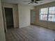 Comfortable bedroom with laminate floors and closet, offering a serene retreat and natural light at 1610 Mulberry Rock Rd, Dallas, GA 30157