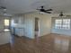 Open-concept living space with laminate flooring and natural light, blending comfort and functionality at 1610 Mulberry Rock Rd, Dallas, GA 30157