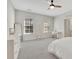 Modern bedroom with carpet and a walk-in closet at 7740 Nesbit Ferry Rd, Atlanta, GA 30350