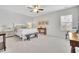 Bright bedroom with large windows, neutral decor and plush carpet at 7740 Nesbit Ferry Rd, Atlanta, GA 30350