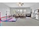 A spacious living room with lots of light and ample room for play at 7740 Nesbit Ferry Rd, Atlanta, GA 30350