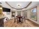 Basement game room includes a poker table, a view of the lake, and high ceilings at 1525 Lockridge Dr, Cumming, GA 30041