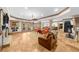 Finished basement with a living area, fireplace, and access to the outdoors at 1525 Lockridge Dr, Cumming, GA 30041
