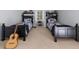 Shared bedroom with two beds, guitar and neutral carpet at 1525 Lockridge Dr, Cumming, GA 30041