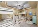 Charming bedroom with white bunk beds, playful decor, and a cozy chair at 1525 Lockridge Dr, Cumming, GA 30041