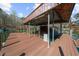 A boat dock with a covered area for boats and a wooden deck for fishing at 1525 Lockridge Dr, Cumming, GA 30041