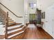 Grand foyer with hardwood floors, staircase, and a chandelier at 1525 Lockridge Dr, Cumming, GA 30041