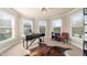 Bright office with many windows, neutral carpet and a desk at 1525 Lockridge Dr, Cumming, GA 30041