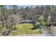 Charming single-story home with a spacious front yard and a tree-lined backdrop at 2415 Bankstone Sw Dr, Marietta, GA 30064