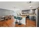 Stylish kitchen with stainless appliances, granite countertops, and an island with bar seating at 3464 Enterkin Ln, Atlanta, GA 30349