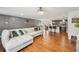 Living area with view to kitchen with granite countertops and stainless appliances at 3464 Enterkin Ln, Atlanta, GA 30349